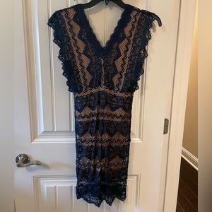 Lace, hip-hugging dress size S.